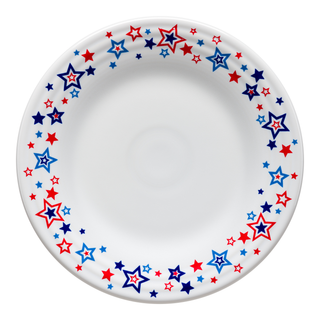 A white plate decorated with red, blue, and white stars of various sizes around the rim, forming a festive border.