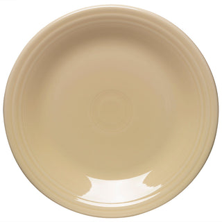 Ivory place setting on a white wood tablescape