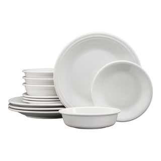 The Fiesta Classic Rim 12-Piece Dinnerware Set in white, service for 4, featuring plates and bowls, is stacked neatly against a plain white background.