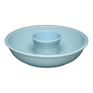 The Fiesta 2-Piece Chip and Dip Set, 12 7/8 inch in sky, features a classic round design with a central dip bowl. Perfectly crafted and made in the USA.