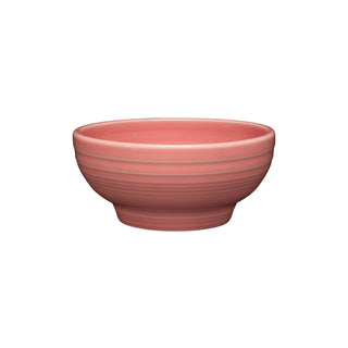 The Fiesta Retired Small 5 1/8 Inch Footed Bowl, 14 oz, in peony features a round shape with subtle horizontal ridges on vitrified china and is shown against a plain white background.