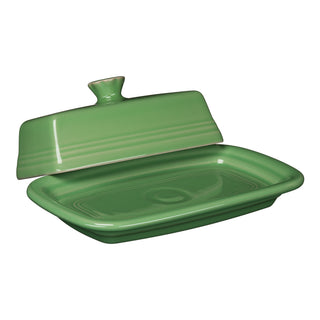 The Fiesta Retired Extra Large Covered Butter Dish in Meadow, measuring 8 1/8" x 5 1/8", is crafted in the USA from lead-safe china with a glossy finish and matching raised lid, shown here against a white background.