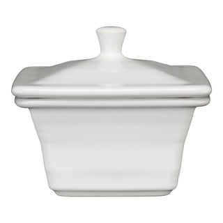 The Retired Fiesta Covered Box by Fiesta, in white, measures 4 5/8" x 3 3/4". This square ceramic box with lid and knob handle is shown front-facing against a plain background—perfect for stylish storage in any space.