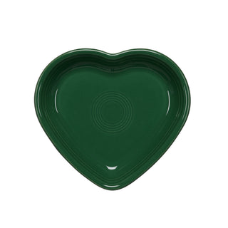 A glossy jade Retired Fiesta 7 1/2 Inch Medium Heart Shaped Bowl (17 oz) by Fiesta, featuring subtle circular ridges in the center and made in the USA, is shown on a white background.