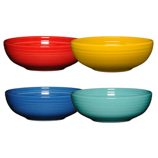 The Fiesta Mixed Vibrant Bistro Coupe 7 5/8-Inch 38OZ Medium Bowls set includes four lead-free ceramic bowls in red, yellow, blue, and teal, featuring simple horizontal ridges and displayed in two rows on a white background.