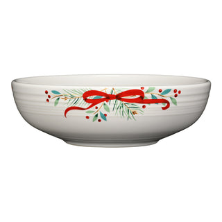 The Fiesta Holly Berry Christmas Garland Bistro Coupe 9 5/8 Inch Large Bowl (68 oz) features a festive holiday design with red ribbons, green leaves, pine needles, and red berries—ideal for your seasonal dinnerware collection.