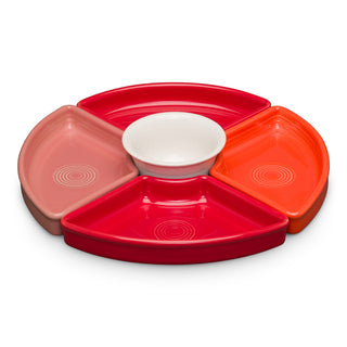The Fiesta Retired Sunset Horizon 5-Piece Mixed Colors Entertaining Set features a round 8 1/5-inch tray with four colorful, triangular sections in pink, red, and orange around a white bowl—perfect as a charcuterie tray.