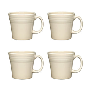 Four Fiesta Linen 15 OZ tapered mugs, set of 4, are arranged in a two-by-two grid on a white background. Each cream-colored china mug features subtle horizontal ridges near the top and is dishwasher safe.