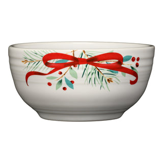 The Fiesta Holly Berry Christmas Garland Bistro Coupe 5 1/2 Inch Cereal Bowl, 22 OZ, features a festive red ribbon, green pine needles, and red berries—perfect for your holiday dinnerware or Fiesta collection.