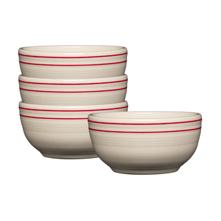 Four cream-colored Fiesta Americana Scarlet Bands bistro coupe cereal bowls (22 oz, 5 1/2") by Fiesta are shown—three stacked and one in front—with two red stripes at the rim, all set against a plain white background. Set includes four bowls.