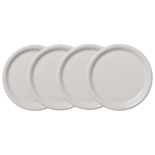 Four plain, round Fiesta White Bistro Coupe 10 1/2 Inch Dinner Plates, set of 4, are arranged overlapping in a diagonal row on a white background, highlighting their sleek simplicity.