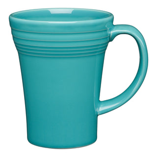 The Fiesta 18 OZ Bistro Latte Mug by Fiesta is a turquoise ceramic mug made in the USA, featuring a large handle and horizontal ridges near the top, shown against a white background.