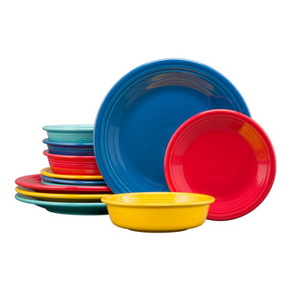 The Fiesta Mixed Vibrant Classic Rim 12-Piece Dinnerware Set, Service for 4, features plates and bowls in blue, red, yellow, turquoise, and orange stacked together on a white background.
