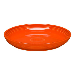 The Fiesta Coupe 10 3/8 Inch Dinner Bowl 40 OZ in poppy features a glossy orange ceramic finish with circular ridged patterns. Versatile and microwave safe, it's perfect for everyday meals and shown against a white background.