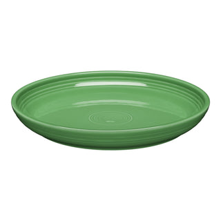 The Fiesta Coupe 10 3/8 Inch Dinner Bowl (40 OZ) in meadow features a plain, round design with a glossy finish and concentric ridges. It is microwave safe and shown on a white background.