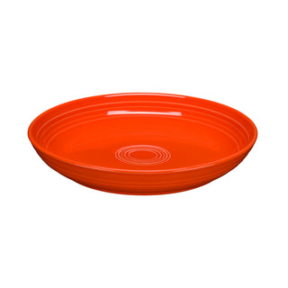 A Fiesta Coupe 8 1/2 Inch Luncheon Bowl (26 OZ) in poppy, featuring concentric circle patterns, displayed at a slight angle on a white background—ideal as your go-to multipurpose bowl.
