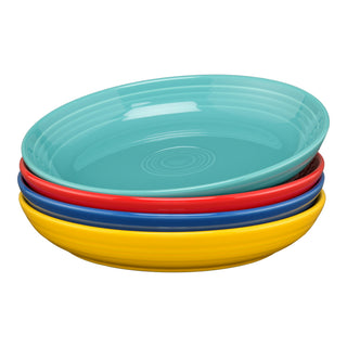 The Fiesta Mixed Vibrant Coupe 8 1/2 Inch Luncheon Bowl Set includes four 26 oz bowls in turquoise, red, blue, and yellow, each with a ribbed edge design—perfect for stylish dining.