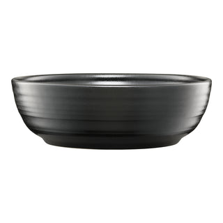 The Fiesta Coupe 6 3/4 Inch Salad Bowl 24 OZ Foundry features a matte black finish, smooth minimalist design, and slightly flared sides. This ceramic bowl is dishwasher safe for easy cleaning and photographed against a white background.