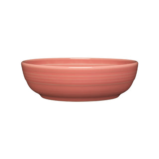 The Fiesta Coupe 6 3/4 Inch Salad Bowl, 24 OZ, in peony, is a round, shallow ceramic bowl shown on a white background and is dishwasher safe for easy cleaning.