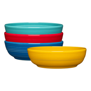 A stack of four Fiesta Mixed Vibrant Coupe 6 3/4 Inch Salad Bowls (24 OZ each) in turquoise, red, blue, and yellow, neatly arranged on a white background.
