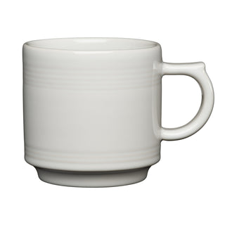 The Fiesta 16 OZ Stackable Mug by Fiesta is a white ceramic mug with a handle and a subtle horizontal line near the top—ideal for coffee bar setups. Shown on a white background.
