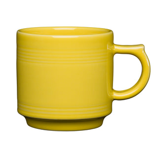 The Fiesta 16 OZ Stackable Mug by Fiesta, in sunflower yellow, features a large handle and subtle horizontal ridges near the top—ideal for any coffee bar—shown on a plain white background.