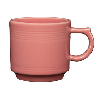 The Fiesta 16 OZ Stackable Mug by Fiesta, shown in peony with a rounded handle and subtle horizontal ridges near the rim, is perfect for any coffee bar setup and is pictured against a white background.