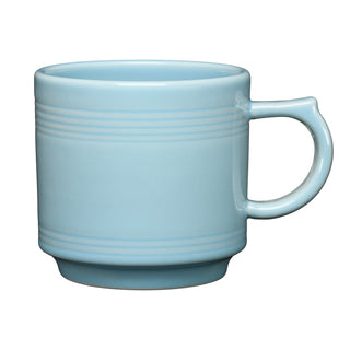 The Fiesta 16 OZ Stackable Mug in sky features a wide handle and subtle horizontal ridges near the rim—ideal for your coffee bar setup. Shown here on a white background.