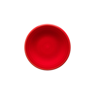 A plain, round scarlet bowl seen from above, centered on white—this is the Fiesta Retired 3 Inch Magnet Mini Dinner Plate, crafted in the USA.
