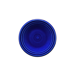 The Fiesta Retired 3 Inch Magnet Mini Dinner Plate, shown in twilight blue with concentric grooves, is a ceramic replica viewed from above on a white background. Made in the USA.