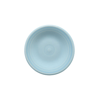 The Fiesta Retired 3 Inch Magnet Mini Dinner Plate in sky features subtle concentric circles and a glossy finish. Photographed from above on a white background, this classic collectible is proudly made in the USA.