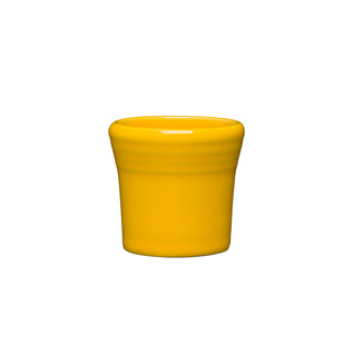 A glossy daffodil yellow Fiesta 1 1/2 OZ Ceramic Shot Glass by Fiesta, made in the USA with a slightly flared rim, is centered on a plain white background.