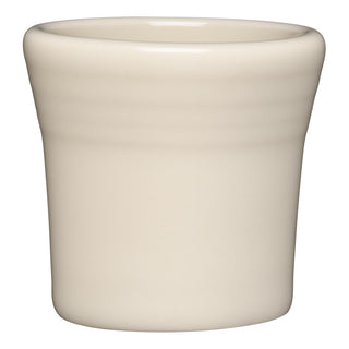 The Fiesta 1 1/2 OZ Ceramic Shot Glass by Fiesta features a linen color, a slightly flared rim, and a smooth matte finish. Made in the USA, it's photographed against a white background.