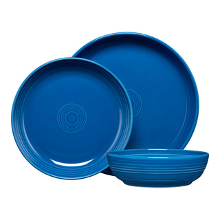 The Fiesta Coupe Bowl 3-Piece Place Setting includes a large dinner plate, medium salad plate, and shallow coupe bowl, each with subtle concentric circles. This lead-safe set adds a touch of elegance to your table.