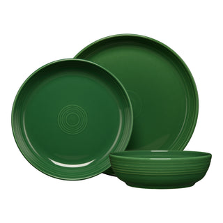 The Fiesta Coupe Bowl 3-Piece Place Setting features a dinner plate, salad plate, and bowl in green, all with concentric ring accents near the center and rim. Crafted from lead-safe china for both style and safety.