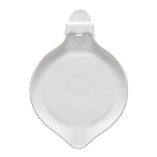 The Fiesta 8 3/4 Inch White Ornament Shaped Plate features a teardrop design with a handle and concentric circles—perfect for adding charm to your fiesta or holiday table.