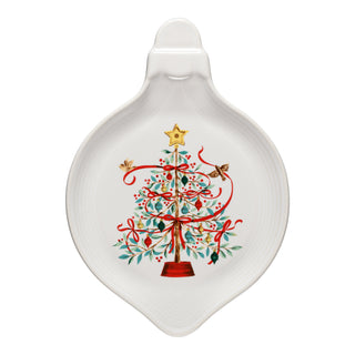 The Fiesta Holly Berry Christmas Tree 8 3/4 Inch Ornament Shaped Plate features a decorated tree with red ribbons, ornaments, a yellow star topper, and small birds in its branches.
