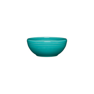 The Fiesta 3 3/4 Inch Mini Bowl (5 OZ) by Fiesta is a small, round turquoise bowl with a smooth, glossy finish, displayed on a white background.