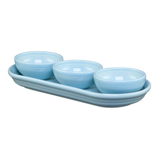 The Fiesta 4-Piece Condiment Set in Sky by Fiesta features three light blue mini bowls arranged on a matching oval serving tray, displayed against a white background.