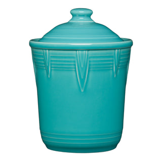 The Retired Fiesta 1 Quart Small Chevron Canister by Fiesta in turquoise features a raised geometric pattern and smooth sides, offering colorful, airtight kitchen storage with a matching lid.