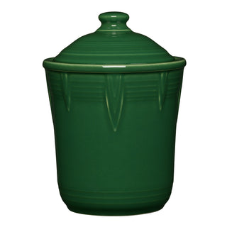 The Retired Fiesta 1 Quart Small Chevron Canister by Fiesta, in jade, features vertical ridges, a matching lid, and a glossy ceramic finish—ideal for adding color and style to your kitchen storage.