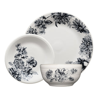 The Fiesta Botanical Floral Black Classic Bistro 3-Piece Place Setting, Service for 1, features a large plate, small plate, and bowl in white ceramic with detailed black floral patterns arranged elegantly.