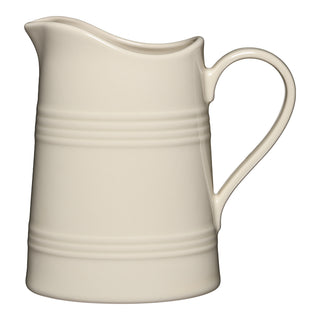 The Fiesta 8 1/2 Pitcher (74 OZ) by Fiesta features a curved handle, spout, and two horizontal embossed lines. Finished in handcrafted linen glaze, this ceramic pitcher is made in the USA and shown against a white background.