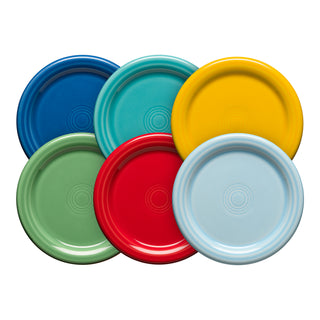 The Fiesta Vibrant 4 3/8 Inch Mixed Color Coaster and Mug Cover set includes six round ceramic pieces in blue, teal, yellow, green, red, and light blue—each with a simple circular pattern for use as coasters or mug covers.