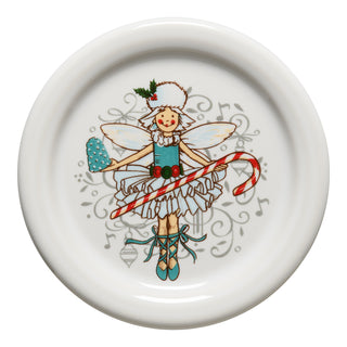 The Fiesta Nutcracker Sugar Plum Fairy 4 3/8 Inch Coaster and Mug Cover features the fairy with wings, blue shoes, festive outfit, heart-shaped mitten, and a red-and-white candy cane surrounded by swirly patterns.