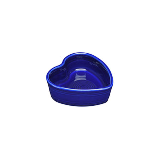 The Retired Fiesta 7 OZ Heart Shaped Ramekin, 4 1/2 inch, in twilight blue, features a heart-shaped design crafted from vitrified china and is shown on a white background.