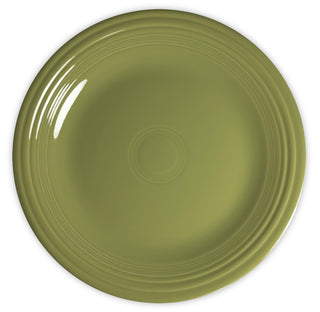 A round, olive green ceramic plate with a glossy finish and concentric circular ridges near the rim, shown from a top-down view against a white background.
