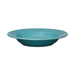 The Fiesta Classic Rim 9 Inch Soup Bowl 13 OZ in turquoise is made in the USA from fully vitrified china, with a wide rim and shallow profile, shown side view on a white background.