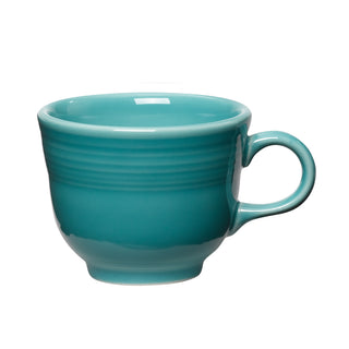 The Fiesta Retired Classic 7 3/4 OZ Tea Cup in turquoise features a handle, smooth glossy finish, and subtle ridges near the rim. Lead-safe china, ideal for coffee or tea, shown against a white background.