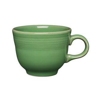 A meadow green ceramic Fiesta Retired Classic 7 3/4 OZ Tea Cup with a handle and subtle ridges near the rim is displayed on a plain white background. The lead-safe china cup features stylish detailing by the renowned Fiesta brand.
